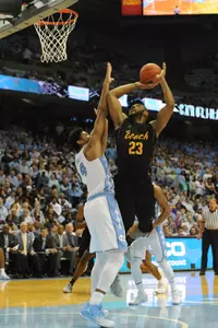 Long Beach State 49ers forward Roschon Prince (23) shoots over North Carolina Tar Heels forward Isaiah Hicks (4) during the first half at Dean E. Smith Center. Evan Pike-USA TODAY Sports