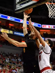 Long Beach State 49ers forward Gabe Levin (0) shoots against Louisville Cardinals forward Anas Mahmoud (14) during the first half at KFC Yum! Center. Jamie Rhodes-USA TODAY Sports