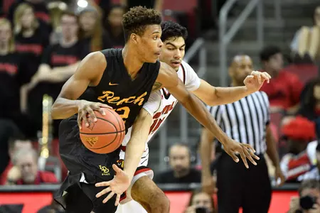 Louisville Cardinals forward Anas Mahmoud (14) reaches in as Long Beach State 49ers forward LaRond Williams (22) dribbles during the second half at KFC Yum! Center. Jamie Rhodes-USA TODAY Sports