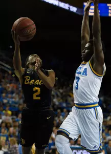 Nov 20, 2016; Los Angeles, CA, USA; Long Beach State 49ers guard Loren Jackson (2) attempts a shot defended by UCLA Bruins guard Aaron Holiday (3). Kelvin Kuo-USA TODAY Sports