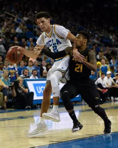 Nov 20, 2016; Los Angeles, CA, USA; UCLA Bruins guard Lonzo Ball (2) moves the ball defended by Long Beach State 49ers guard Justin Bibbins (21). Kelvin Kuo-USA TODAY Sports