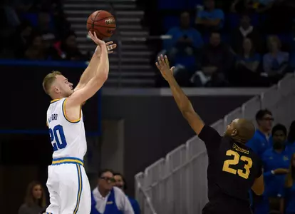 Nov 20, 2016; Los Angeles, CA, USA; UCLA Bruins guard Bryce Alford (20) attempts a shot defended by Long Beach State 49ers forward Roschon Prince (23). Kelvin Kuo-USA TODAY Sports