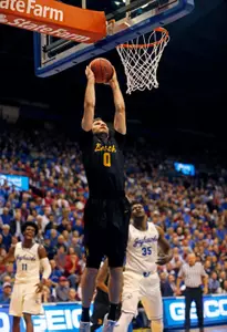 49ers forward Gabe Levin (0) dunks the ball as Kansas Jayhawks center Udoka Azubuike (35) defends. Jay Biggerstaff-USA TODAY Sports
