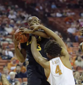 Dec 10, 2016; Austin, TX, USA; Long Beach State 49ers guard Noah Blackwell (3) and Texas Longhorns center James Banks (4) fight for a loose ball. Sean Pokorny-USA TODAY Sports