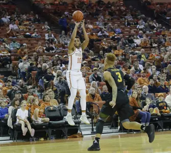 Dec 10, 2016; Austin, TX, USA; Texas Longhorns guard Eric Davis Jr. (10) shoots the ball against Long Beach State 49ers guard Noah Blackwell (3). Sean Pokorny-USA TODAY Sports