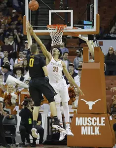 Dec 10, 2016; Austin, TX, USA; Long Beach State 49ers forward Gabe Levin (0) shoots the ball against Texas Longhorns forward Jarrett Allen (31). Sean Pokorny-USA TODAY Sports