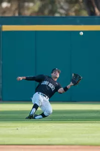 Senior Zack Rivera made this sliding catch in the top of the ninth to strand the potential tying run at third base and give the Dirtbags a 2-1 win.
