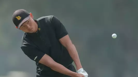 Senior Michael Chen sits on top of the leaderboard after firing a career and tournament low 64 in Monday's second round at the Del Walker Intercollegiate Golf Classic.  (Photos by John Fajardo/LBSU)
