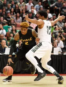 49ers guard Nick Faust drives the ball while Hawaii Rainbow Warriors guard Aaron Valdes defends during the first half in the championship game of the Big West conference tournament at Honda Center. Credit: Kelvin Kuo-USA TODAY Sports
