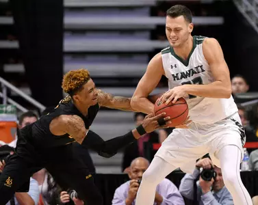 49ers guard Nick Faust attempts to steal the ball from Hawaii Rainbow Warriors forward Stefan Jankovic during the first half in the championship game of the Big West conference tournament at Honda Center. Credit: Kelvin Kuo-USA TODAY Sports