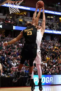 49ers forward Roschon Prince and Hawaii Rainbow Warriors center Stefan Jovanovic battle for the ball during the first half in the championship game of the Big West conference tournament at Honda Center. Credit: Kelvin Kuo-USA TODAY Sports