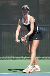 Georgie Sanders' 6-4, 6-4 win at No. 6 clinched the win for the Beach, who went on to sweep the Titans, 7-0.