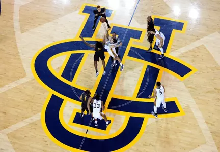 UC Irvine Anteaters center Ioannis Dimakopoulos (12) and 49ers forward Mason Riggins (5) battle for the tip off during the first half of the game at Bren Events Center. Credit: Orlando Ramirez-USA TODAY Sports