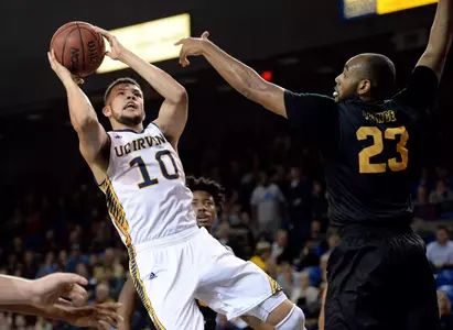 UC Irvine Anteaters guard Luke Nelson (10) shoots the ball over 49ers forward Roschon Prince (23) during the first half of the game at Bren Events Center. Credit: Orlando Ramirez-USA TODAY Sports