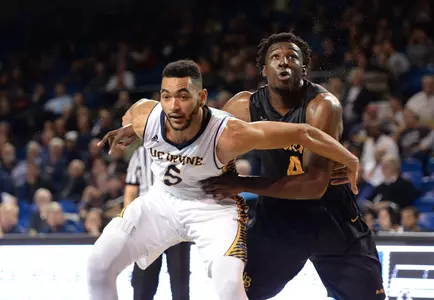 49ers forward Temidayo Yussuf (4) and UC Irvine Anteaters forward Jonathan Galloway (5) battle for a rebound during the second half at Bren Events Center. Credit: Orlando Ramirez-USA TODAY Sports