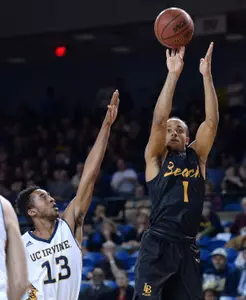 49ers guard Evan Payne (1) shoots the ball as UC Irvine Anteaters forward Brandon Smith (13) defends during the second half at Bren Events Center. Credit: Orlando Ramirez-USA TODAY Sports