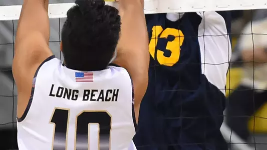 Apr 20, 2017; Long Beach, CA, USA; Long Beach St. 49ers setter Josh Tuaniga (10) and UC Irvine Anteaters middle blocker Scott Stadick (13) battle for the ball on the net during the semi-final at Walter Pyramid. Long Beach St. 49ers won 3-0. Mandatory Credit: Jayne Kamin-Oncea-USA TODAY Sports