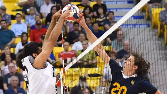 Apr 20, 2017; Long Beach, CA, USA; Irvine Anteaters outside hitter Thomas Hodges (20) spikes the ball past Long Beach St. 49ers setter Josh Tuaniga (10) during semi-final at Walter Pyramid. Long Beach St. 49ers won 3-0. Mandatory Credit: Jayne Kamin-Oncea-USA TODAY Sports