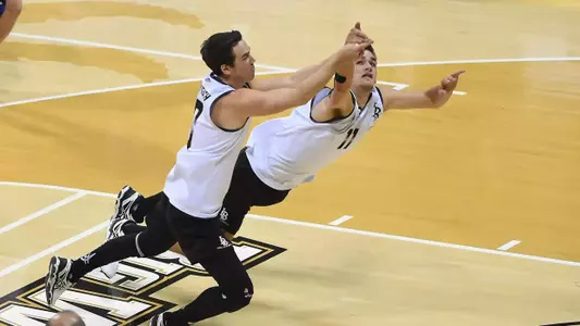 Long Beach State 49ers Matt Butler (3) and TJ DeFalco (11) dive for a ball during the MPSF final game against the Hawaii Rainbow Warriors at the Walter Pyramid. Long Beach State won 3-1. Jayne Kamin-Oncea-USA TODAY Sports