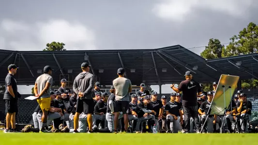 Team Huddle Listening to Coach Valenzuela