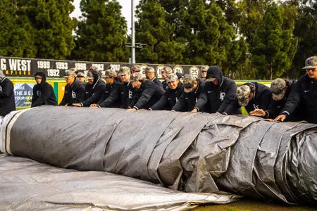 Team Tarping the Field