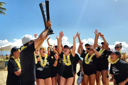 Team Celebrating with Big West Trophy