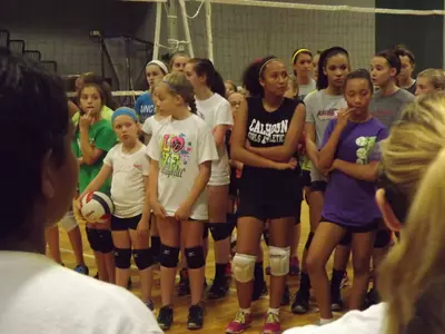 The kids listening to head coach Palileo, coach Susan and the gang!
