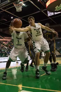 Colin Voss reaches for a loose ball in Thursday's 74-64 loss to Southern Miss.