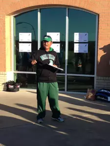 Head coach Sujay Lama makes morning announcements to get Day 1 of the Wild West Shootout underway.