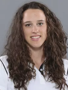 Krista Rossum won three events as North Texas beat Rice, 151-140.