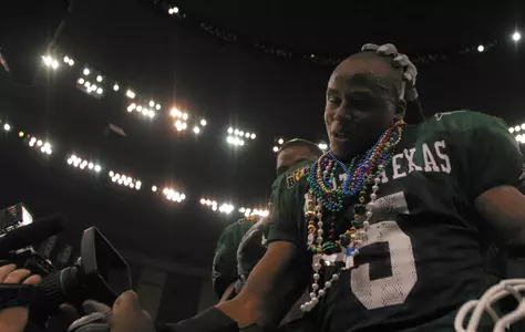 New Orleans Bowl MVP Kevin Galbreath celebrates the victory with his teammates.