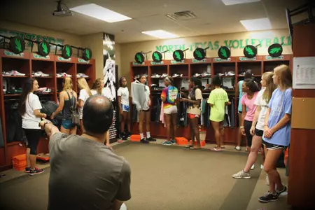 North Texas head coach Andrew Palileo addresses the 2014 squad at the preseason gear reveal.