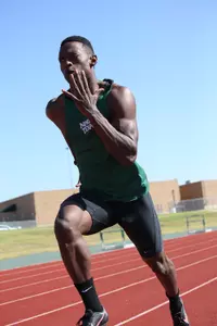 Collin Heard places fifth in the men's 200 meter dash.