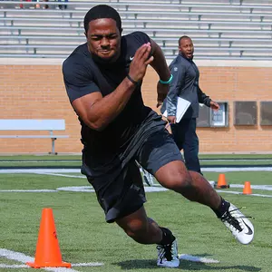 Derek Akunne works out for NFL scouts at North Texas pro day