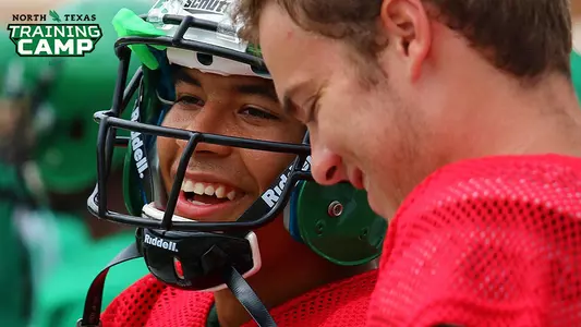 QB Mason Fine smiles after throwing a touchdown pass in Saturday's scrimmage (photo by David Pyke)