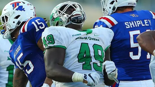 North Texas defensive lineman Roderick Young celebrates one of his three tackles for loss against Louisiana Tech (photo by Rick Yeatts)
