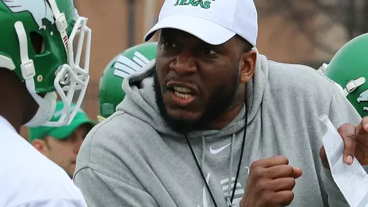Defensive line coach Marc Yellock goes through his first practice at North Texas (photo by David Pyke)