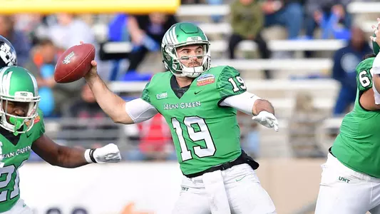 Quinn Shanbour prepares to throw at the New Mexico Bowl