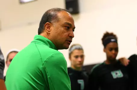 Coach Palileo in huddle vs. Texas Tech