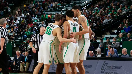 Men's Basketball Team Huddle