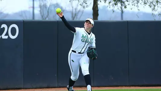 Hanna Rebar makes a throw from the outfield