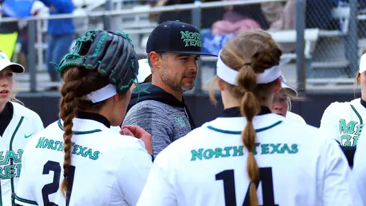 North Texas softball coach Rodney DeLong addresses his team