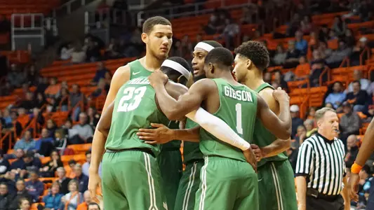 Men's Basketball Team Huddle