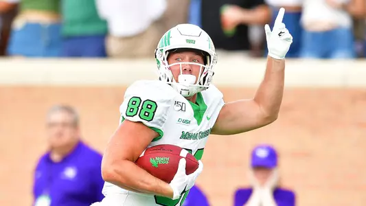 Jason Pirtle scores one of his three first-half touchdowns Saturday against Abilene Christian