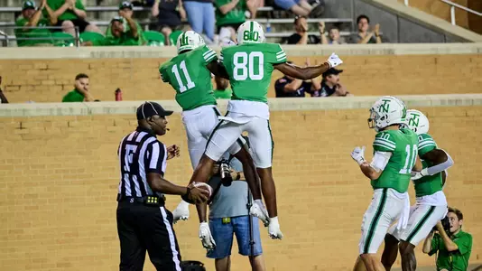Detraveon Brown and Zhighlil McMillan celebrate touchdown