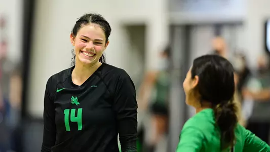 Rhett Robinson smiles during a North Texas volleyball match