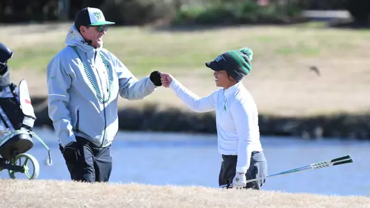 Patricia Sinolungan and head coach Michael Akers at the Tulane Classic in New Orleans