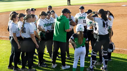 UNT softball huddles between innings against Wichita State on April 24