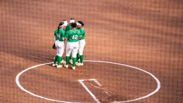 Softball huddles in pitching circle at South Florida on April 30