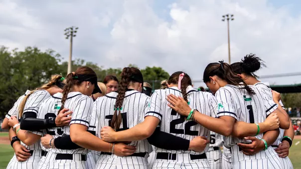 Softball huddles ahead of its game at South Florida on May 2